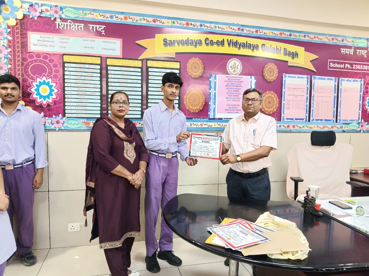 Certificates were distributed at Gulabi Bagh Government School by the Principal.