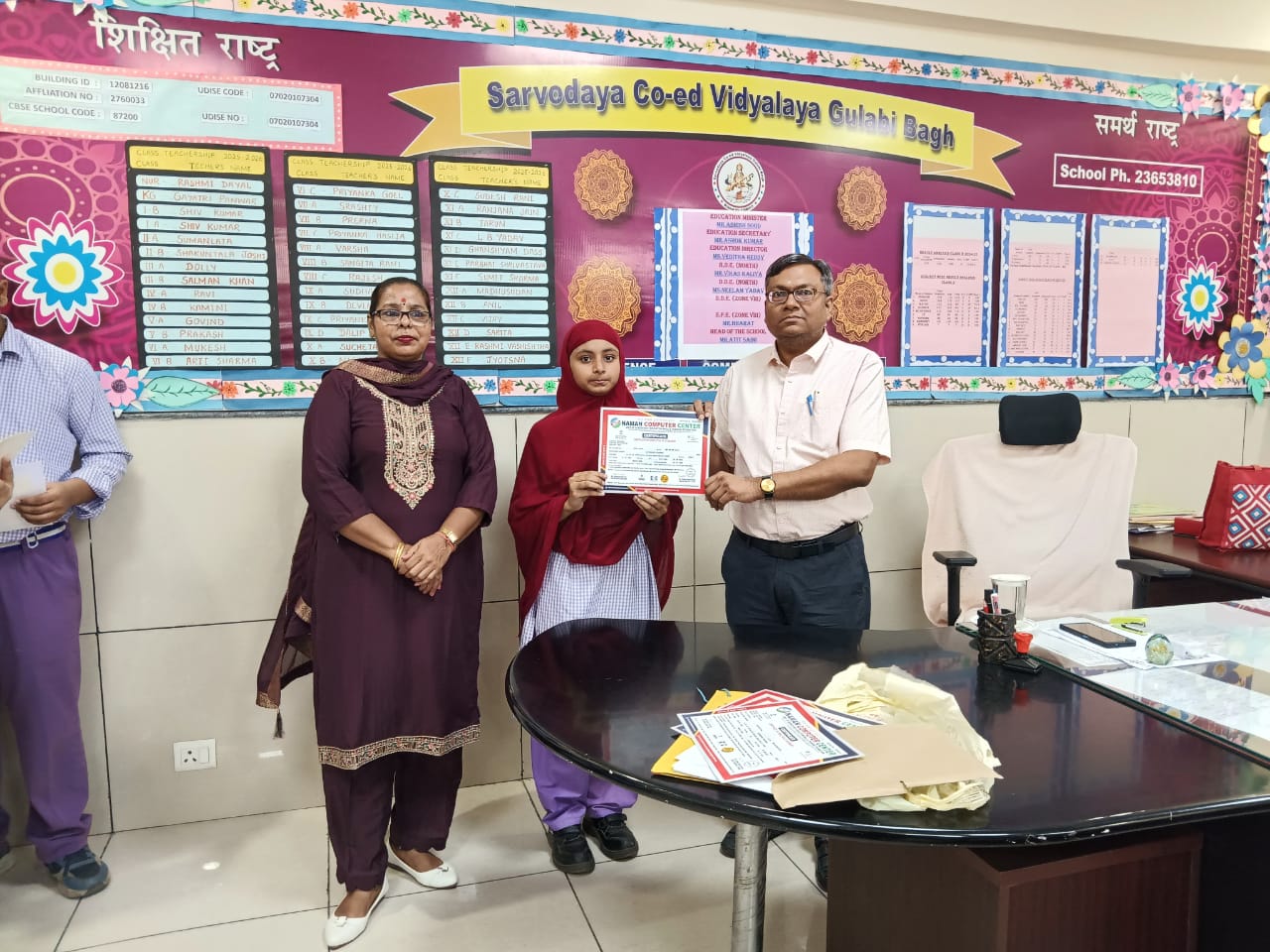 Certificates were distributed at Gulabi Bagh Government School by the Principal.