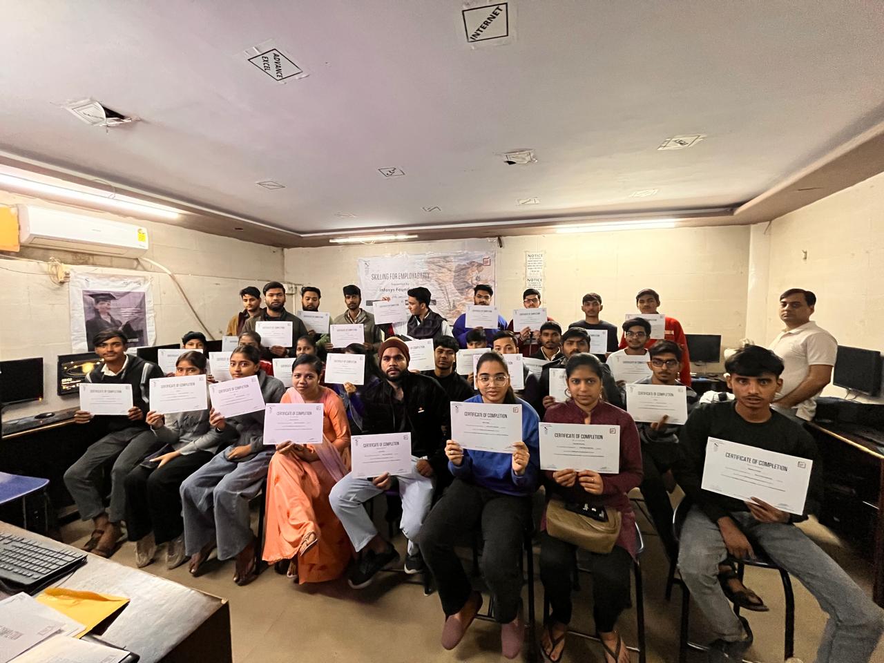 Certificates were distributed to students by Naman Sir at Naman Computer Center.