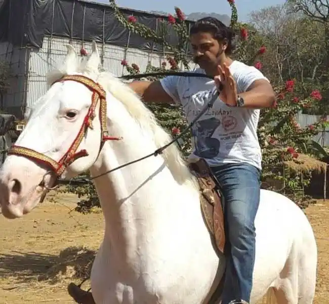 Devdatta-Nage-riding-a-horse