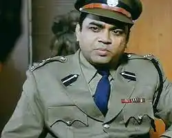 Paresh Rawal as Police Commissioner Amod Shukla in the movie Satya