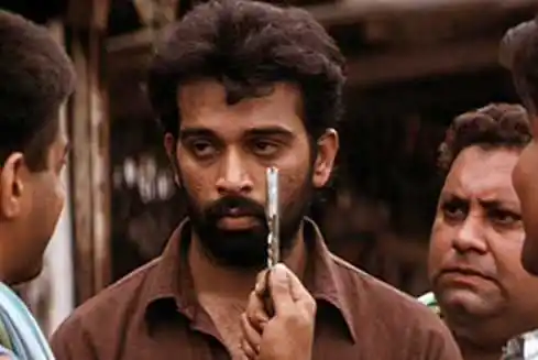 J.D. Chakravarthy as Satya in the movie Satya