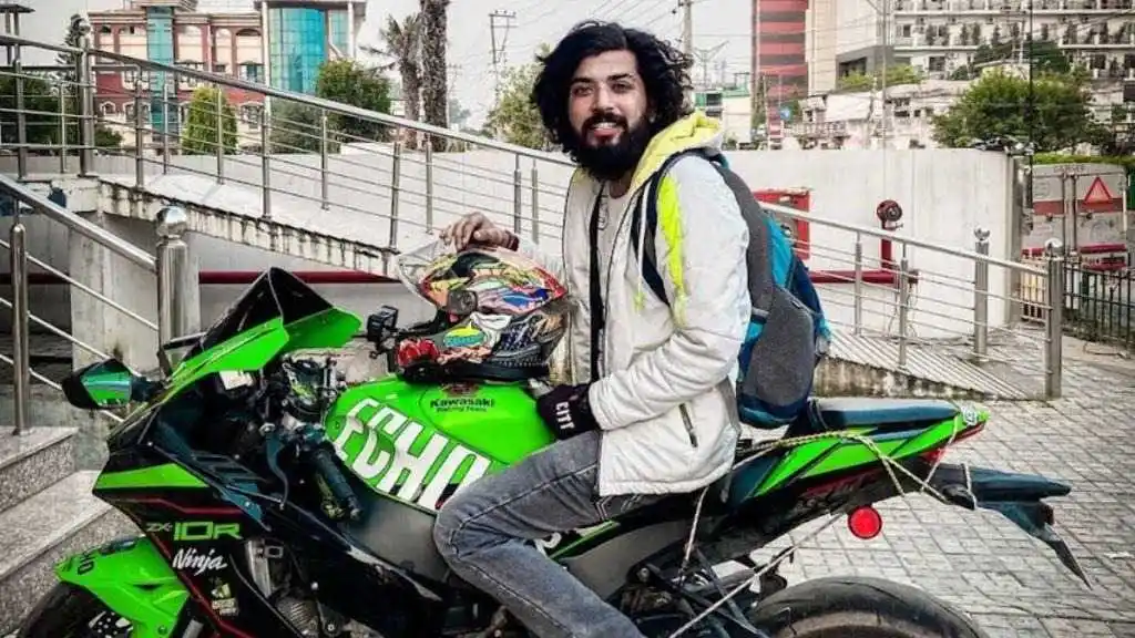 Anurag Dobhal posing with his bike