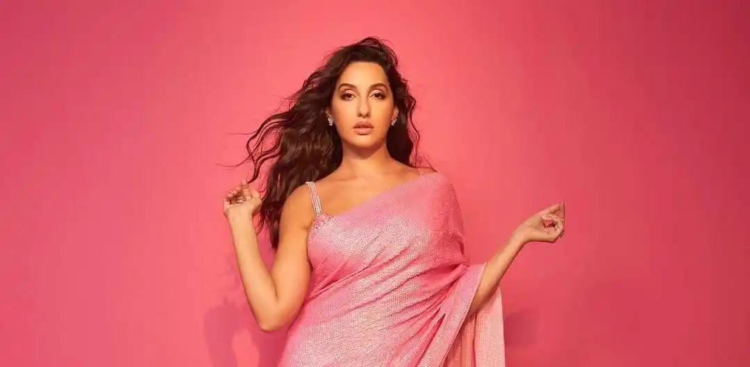 Nora Fatehi Pink Saree.tring Nora Fatehi Pink Saree